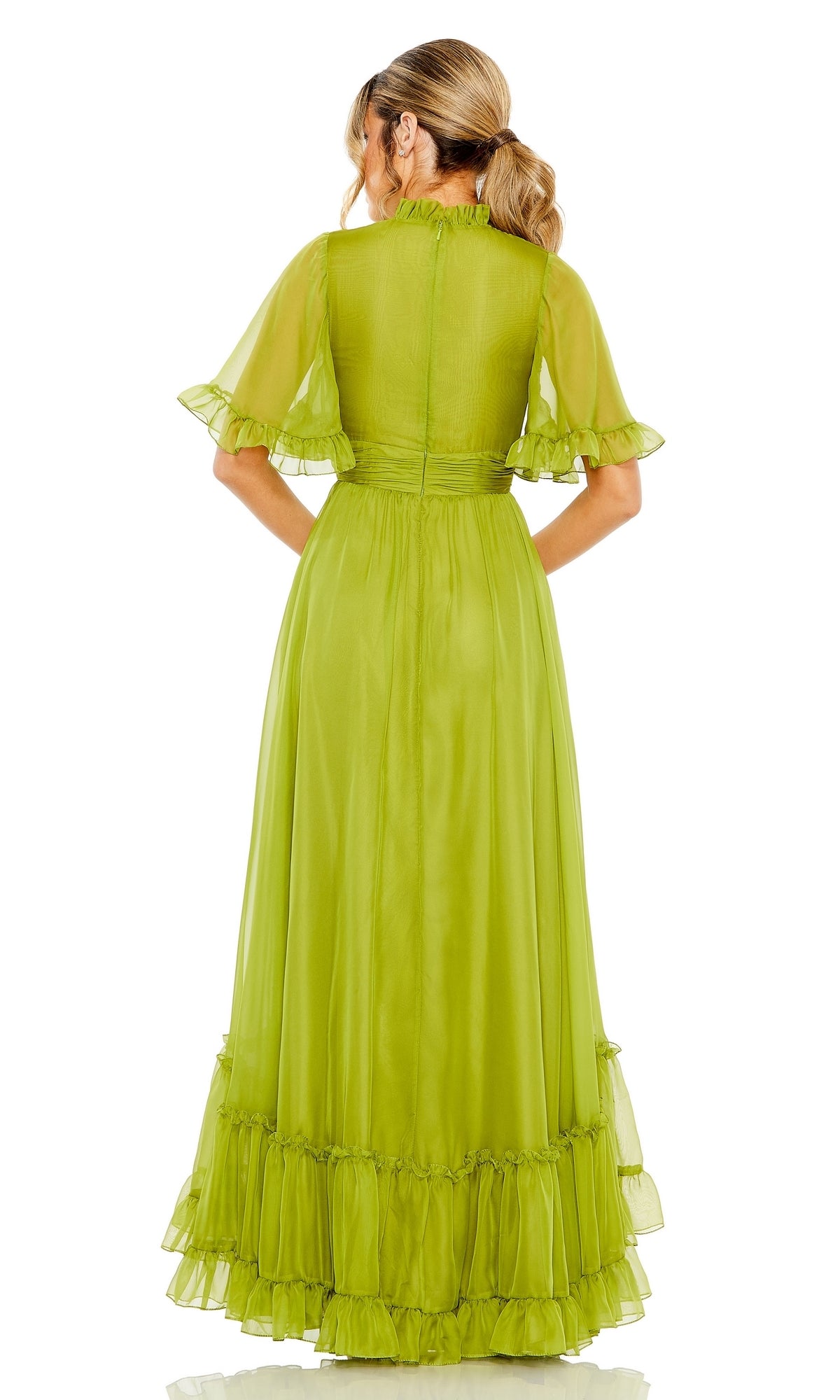 Woman wearing the Mac Duggal 68229 short sleeve long formal dress in light green, featuring a semi-sheer design, flutter sleeves, and ruffled hem, standing with her back to the camera.